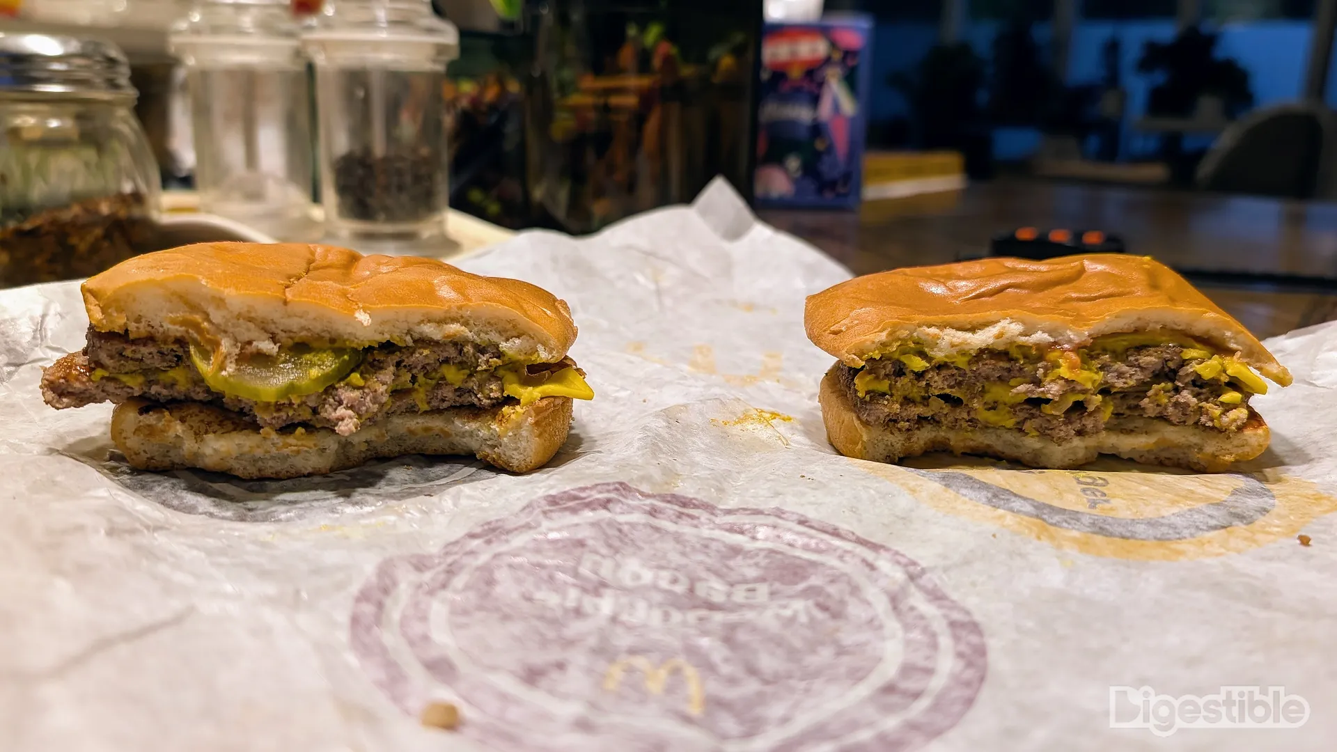 A McDouble and Double Cheeseburger side by side.