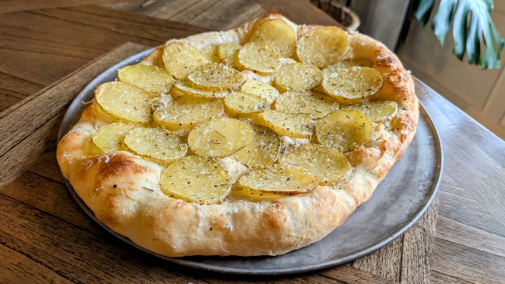 Potatoes on a pizza.